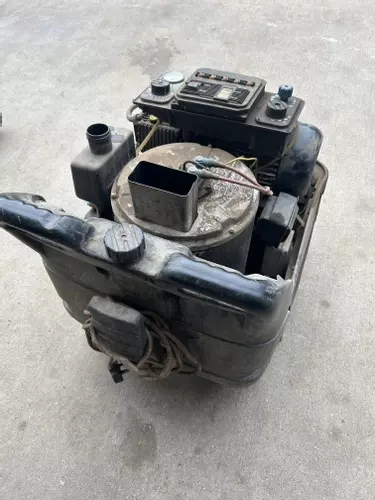 Dirty and worn Edge Panther pressure washer prior to service and repair, showing condition before maintenance work.